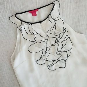 Blank and white ruffled blouse